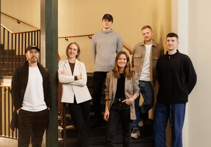 group of people stood on the stairs
